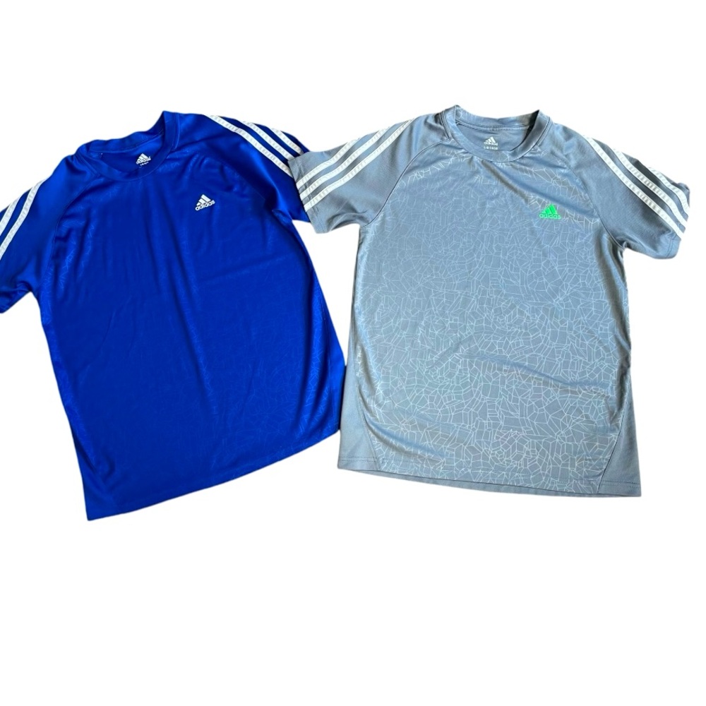 Pair of Adidas Youth Large Climalite dri-fit shirts.